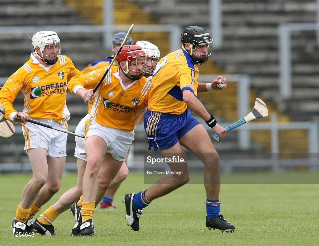 30 June 2007; Brendan Bolger, Clare, in action against Paddy McGill and John McIntosh, Antrim. Guinness All-Ireland Hurling Championship Qualifier, Group 1A, Round 1, Antrim v Clare, Casement Park, Belfast, Co. Antrim. Picture credit: Oliver McVeigh / SPORTSFILE