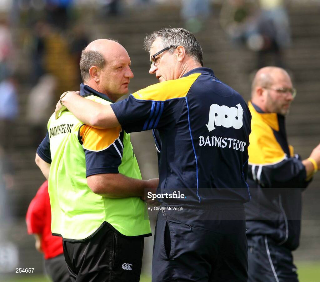 30 June 2007; Clare manager Tony Considine commiserates with Antrim joint manager Terence McNaughton after the final whistle. Guinness All-Ireland Hurling Championship Qualifier, Group 1A, Round 1, Antrim v Clare, Casement Park, Belfast, Co. Antrim. Picture credit: Oliver McVeigh / SPORTSFILE