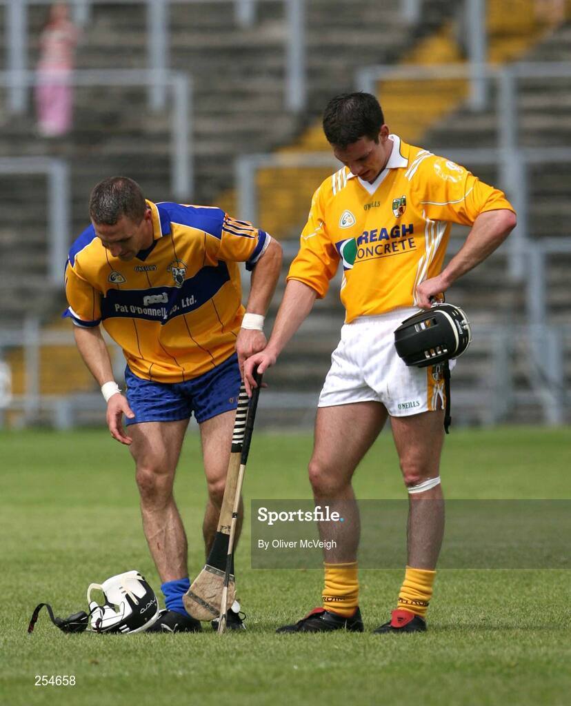 30 June 2007; A dejected Michael Herron, Antrim, stands with Gerry Quinn, Clare, after the final whistle. Guinness All-Ireland Hurling Championship Qualifier, Group 1A, Round 1, Antrim v Clare, Casement Park, Belfast, Co. Antrim. Picture credit: Oliver McVeigh / SPORTSFILE
