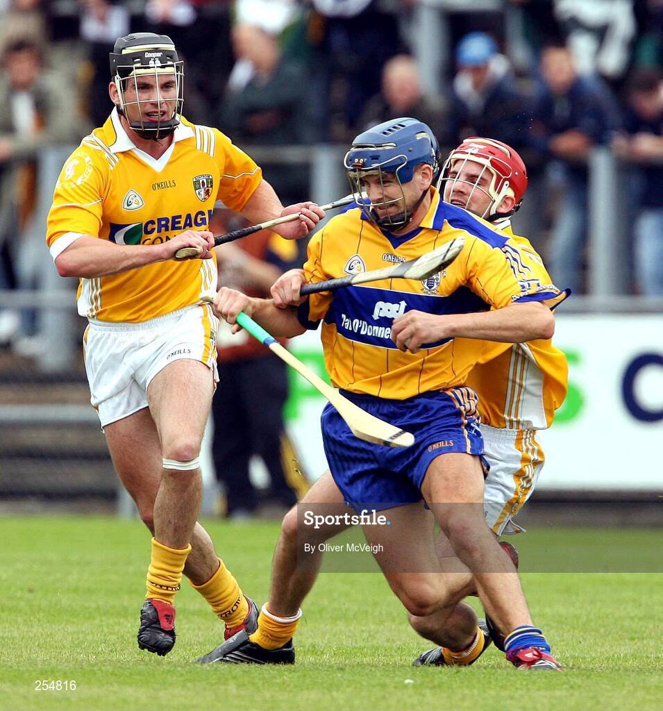 30 June 2007; Gerry O'Grady, Clare, in action against Michael Herron and Shane McNaughton, Antrim. Guinness All-Ireland Hurling Championship Qualifier, Group 1A, Round 1, Antrim v Clare, Casement Park, Belfast, Co. Antrim. Picture credit: Oliver McVeigh / SPORTSFILE