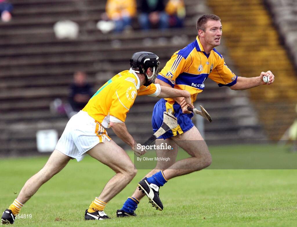 30 June 2007; Declan O'Rourke, Clare, in action against Ciaran Herron, Antrim. Guinness All-Ireland Hurling Championship Qualifier, Group 1A, Round 1, Antrim v Clare, Casement Park, Belfast, Co. Antrim. Picture credit: Oliver McVeigh / SPORTSFILE