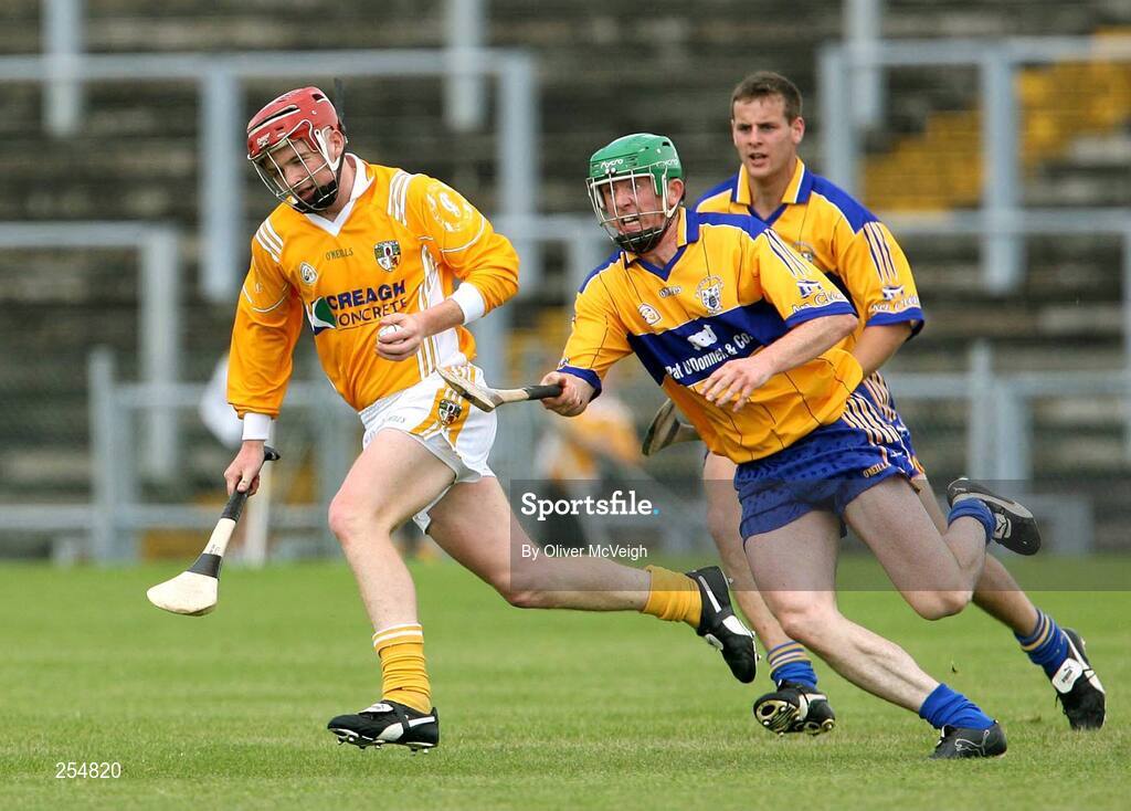 30 June 2007; Paddy McGill, Antrim, in action against Diarmuid McMahon, Clare. Guinness All-Ireland Hurling Championship Qualifier, Group 1A, Round 1, Antrim v Clare, Casement Park, Belfast, Co. Antrim. Picture credit: Oliver McVeigh / SPORTSFILE
