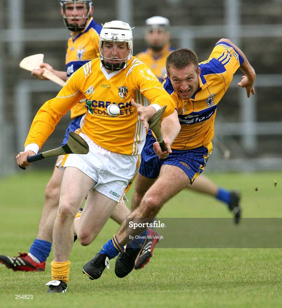 30 June 2007; Karl Stewart, Antrim, in action against Declan O'Rourke, Clare. Guinness All-Ireland Hurling Championship Qualifier, Group 1A, Round 1, Antrim v Clare, Casement Park, Belfast, Co. Antrim. Picture credit: Oliver McVeigh / SPORTSFILE