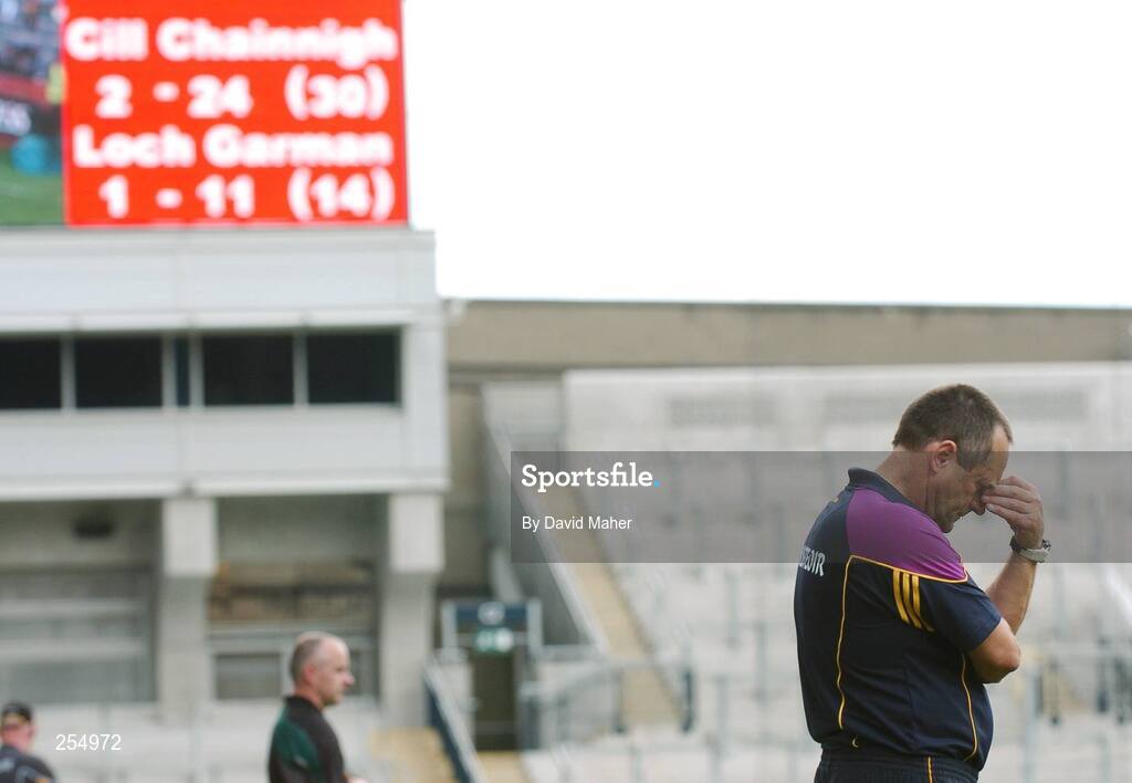 1 July 2007; A dejected Wexford manager John Meyler, with the scoreboard in the background, during the closing stages of the game. Guinness Leinster Senior Hurling Championship Final, Kilkenny v Wexford, Croke Park, Dublin. Picture credit: David Maher / SPORTSFILE