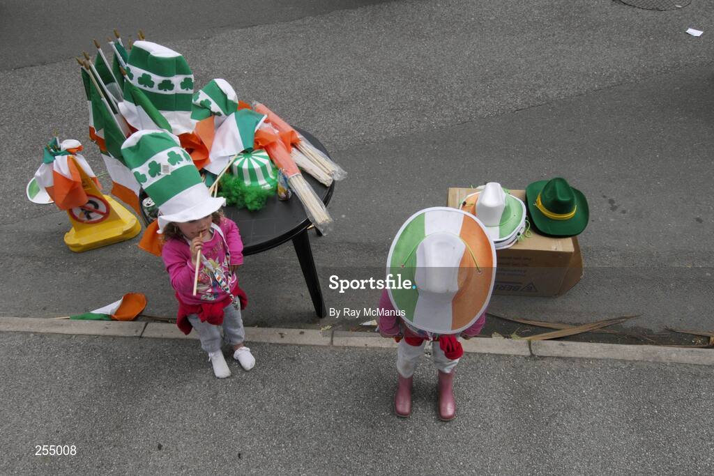 1 July 2007; Three and a half year old Lily O'Brien, left, and her five year old sister Barbara assist at their parents stall outside the ground. Bank of Ireland Munster Senior Football Championship Final, Kerry v Cork, Fitzgerald Stadium, Killarney, Co. Kerry. Picture credit: Ray McManus / SPORTSFILE