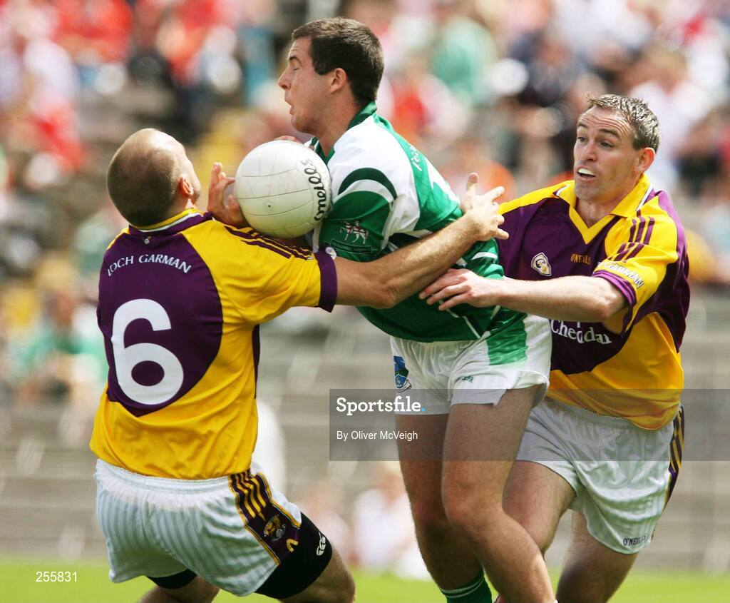8 July 2007; Ryan Keenan, Fermanagh, in action against Philip Wallace and Colm Morris, Wexford. Bank of Ireland All-Ireland Senior Football Championship Qualifier, Round 1, Fermanagh v Wexford, St Tighearnach's Park, Clones, Co. Monaghan. Picture credit: Oliver McVeigh / SPORTSFILE
