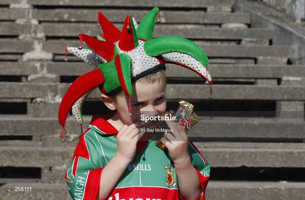 7 July 2007; Mayo supporter Sean Ferrick, five years, from  Kilvine, Irishtown, Claremorris, enjoys a chocolate bar. Bank of Ireland All-Ireland Senior Football Championship Qualifier, Round 1, Mayo v Cavan, McHale Park, Castlebar, Co. Mayo. Picture credit: Ray McManus / SPORTSFILE