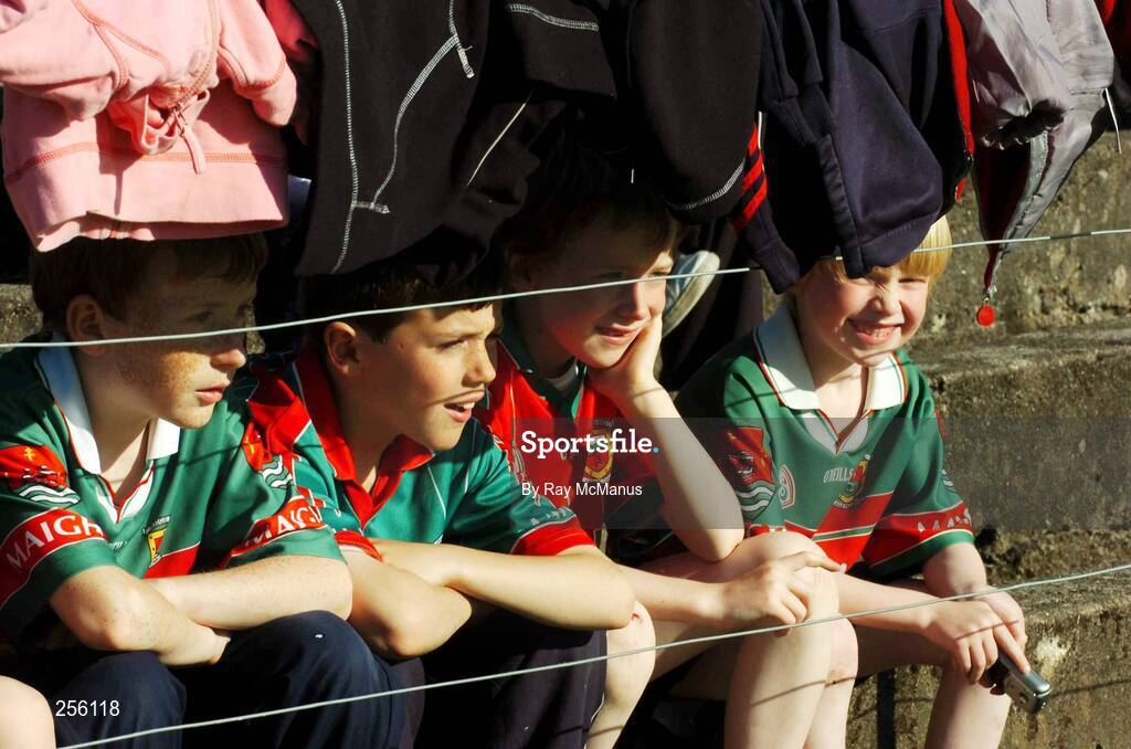 7 July 2007; Mayo supporters use their jackets as a sun shade before the game. Bank of Ireland All-Ireland Senior Football Championship Qualifier, Round 1, Mayo v Cavan, McHale Park, Castlebar, Co. Mayo. Picture credit: Ray McManus / SPORTSFILE