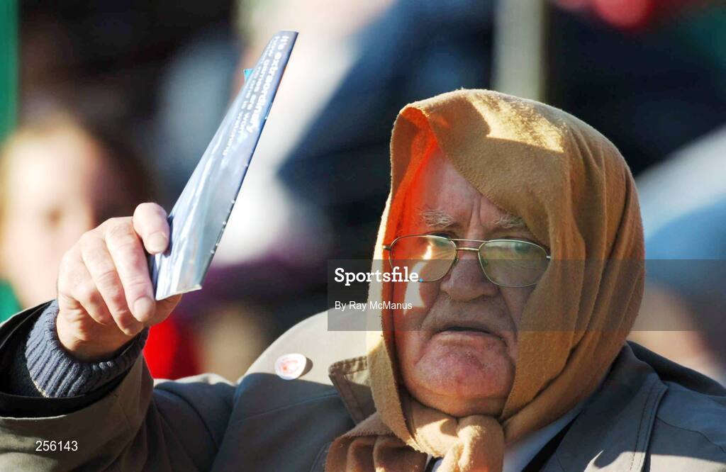 7 July 2007; A Mayo supporter uses a programme to shade his eyes from the sun. Bank of Ireland All-Ireland Senior Football Championship Qualifier, Round 1, Mayo v Cavan, McHale Park, Castlebar, Co. Mayo. Picture credit: Ray McManus / SPORTSFILE