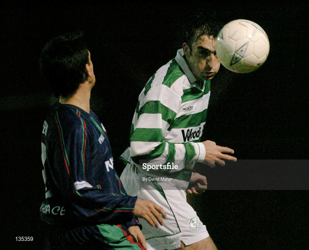 26 March 2004; Terry Palmer of Shamrock Rovers in action against Neale Fenn of Cork City during the Eircom League Premier Division match between Shamrock Rovers and Cork City at Richmond Park in Dublin. Photo by David Maher/Sportsfile