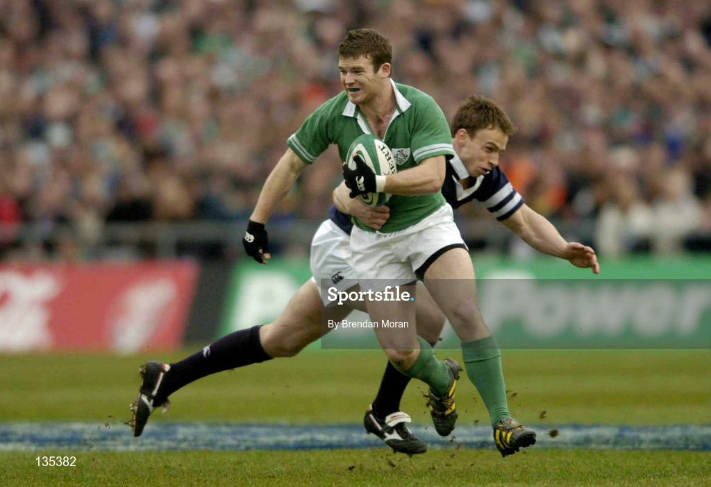 27 March 2004; Gordon D'Arcy of Ireland is tackled by Andrew Henderson of Scotland during the RBS Six Nations Rugby Championship match between Ireland and Scotland at Lansdowne Road in Dublin. Photo by Brendan Moran/Sportsfile