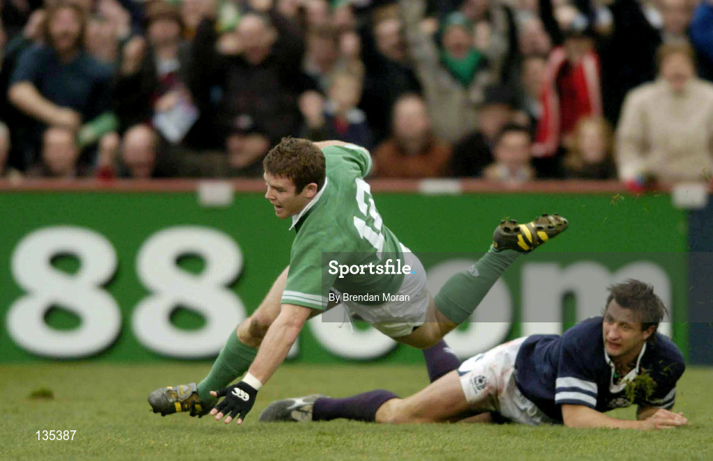 27 March 2004; Gordon D'Arcy of Ireland dives over to score his side's first try during the RBS Six Nations Rugby Championship match between Ireland and Scotland at Lansdowne Road in Dublin. Photo by Brendan Moran/Sportsfile