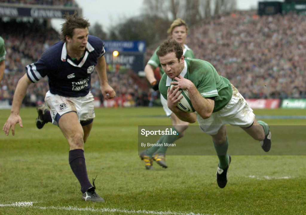27 March 2004; Geordan Murphy of Ireland dives over to score his side's second try during the RBS Six Nations Rugby Championship match between Ireland and Scotland at Lansdowne Road in Dublin. Photo by Brendan Moran/Sportsfile