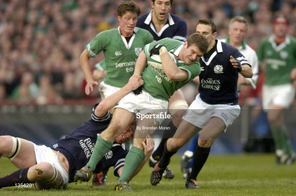 27 March 2004; Gordon D'Arcy of Ireland in action against Scott Murray and Andrew Henderson of Scotland during the RBS Six Nations Rugby Championship match between Ireland and Scotland at Lansdowne Road in Dublin. Photo by Brendan Moran/Sportsfile
