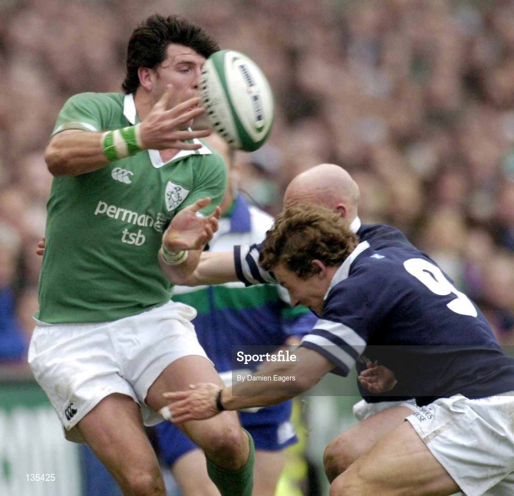 27 March 2004; Shane Horgan of Ireland in action against Chris Cusiter of Scotland during the RBS Six Nations Rugby Championship match between Ireland and Scotland at Lansdowne Road in Dublin. Photo by Damien Eagers/Sportsfile