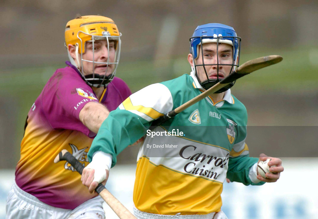 28 March 2004; David Franks of Offaly in action against Michael Jordan of Wexford during the Allianz Hurling League Division 1B match between Offaly and Wexford at St. Brendan's Park in Birr, Offaly. Photo by David Maher/Sportsfile