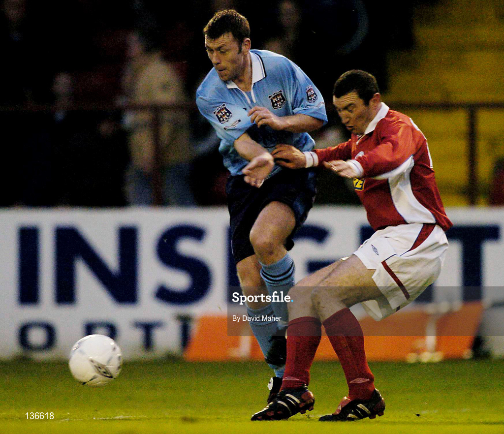 9 April 2004; Dom Tierney of Dublin City in action against Jason Byrne of Shelbourne during the Eircom League Premier Division match between Shelbourne and Dublin City at Tolka Park in Dublin. Photo by David Maher/Sportsfile
