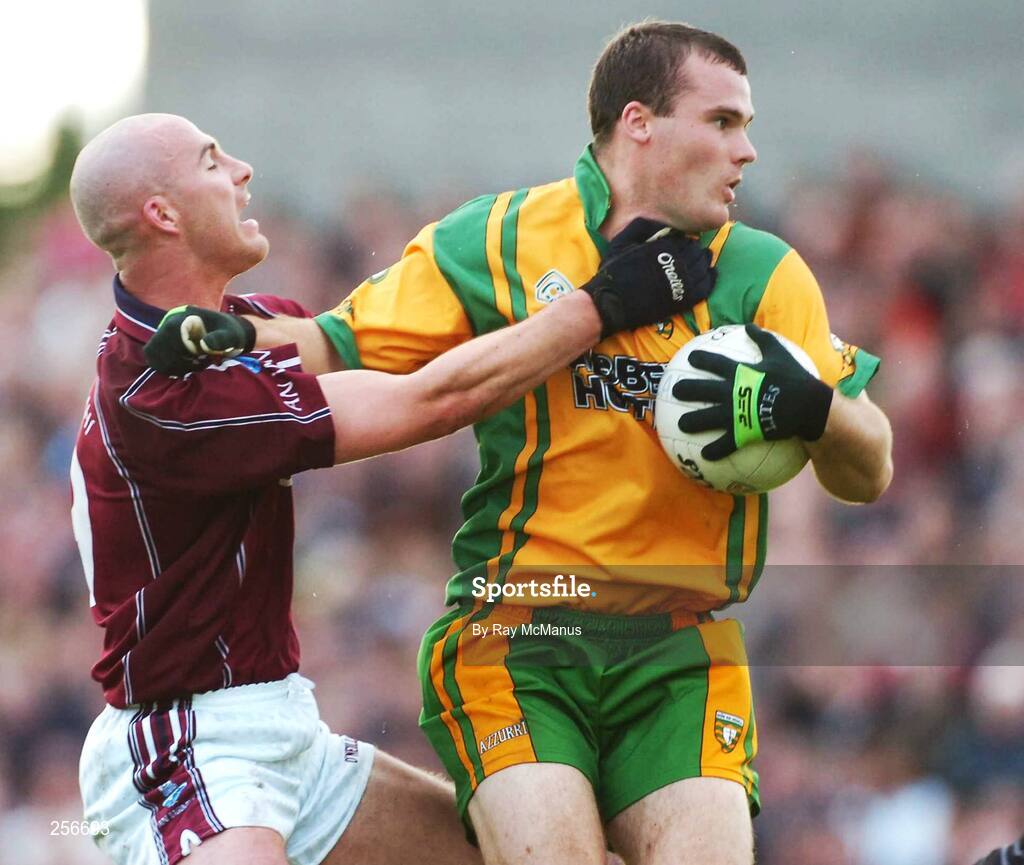 14 July 2007; Neil McGee, Donegal, in action against Martin Flanagan, Westmeath. Bank of Ireland All-Ireland Football Championship Qualifier, Round 2, Westmeath v Donegal, Cusack Park, Mullingar, Co. Westmeath. Picture credit: Ray McManus / SPORTSFILE