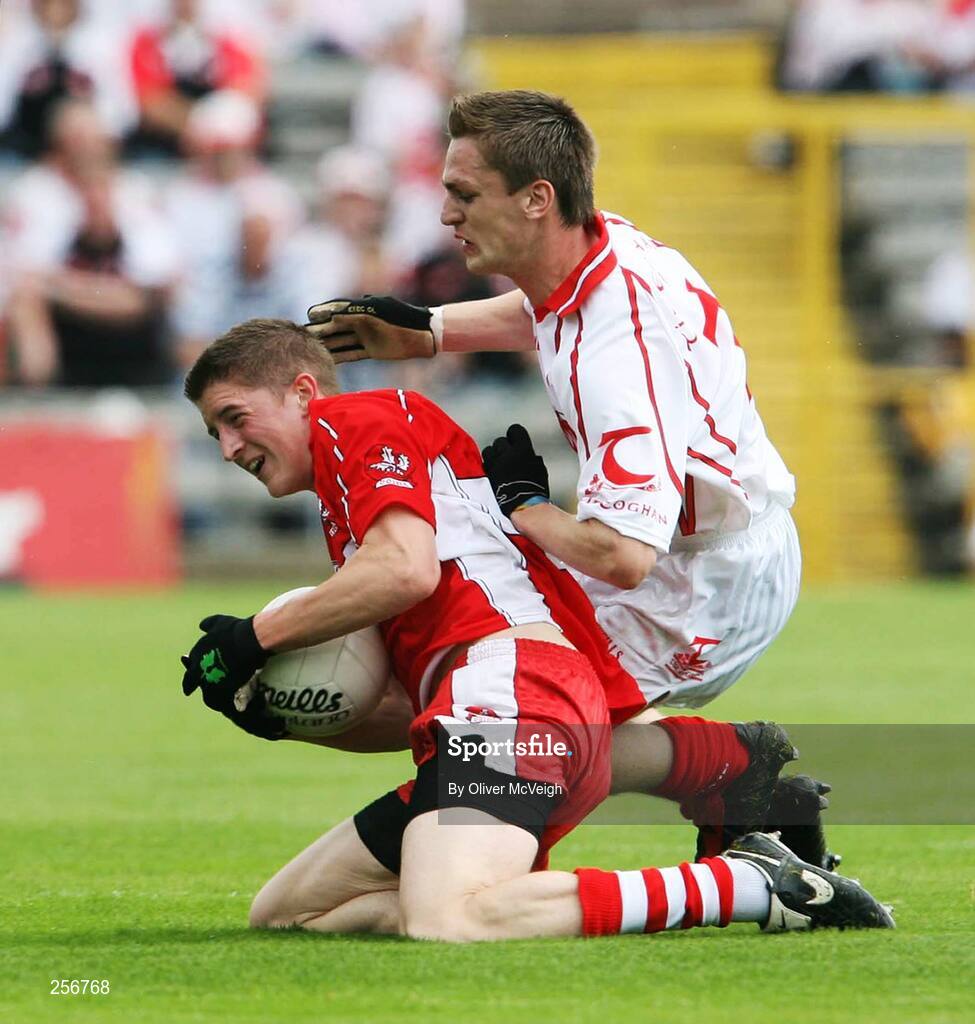 15 July 2007; Declan Mullan, Derry, in action against Kevin Mossey, Tyrone. ESB Ulster Minor Football Championship Final - Derry v Tyrone, St Tighearnach's Park, Clones, Co Monaghan. Picture credit: Oliver McVeigh / SPORTSFILE