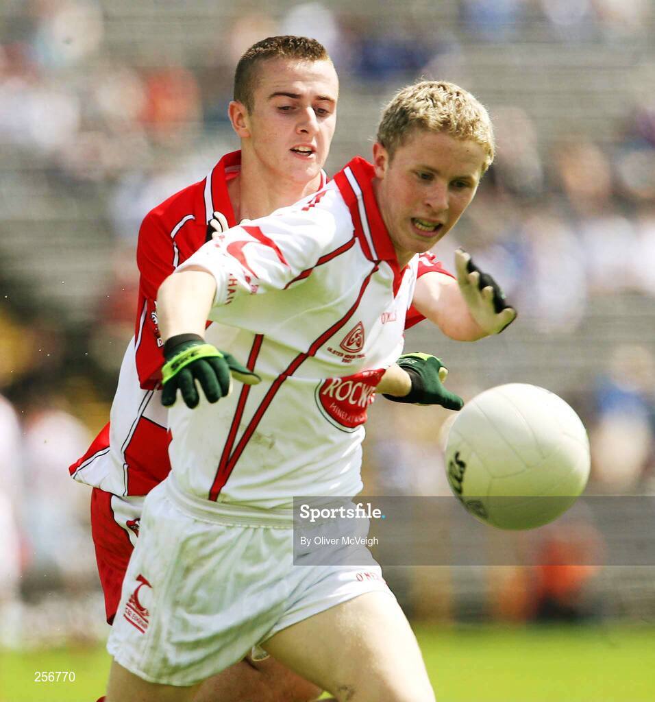 15 July 2007; Peter Hughes, Tyrone, in action against Brendan Henry, Derry. ESB Ulster Minor Football Championship Final - Derry v Tyrone, St Tighearnach's Park, Clones, Co Monaghan. Picture credit: Oliver McVeigh / SPORTSFILE
