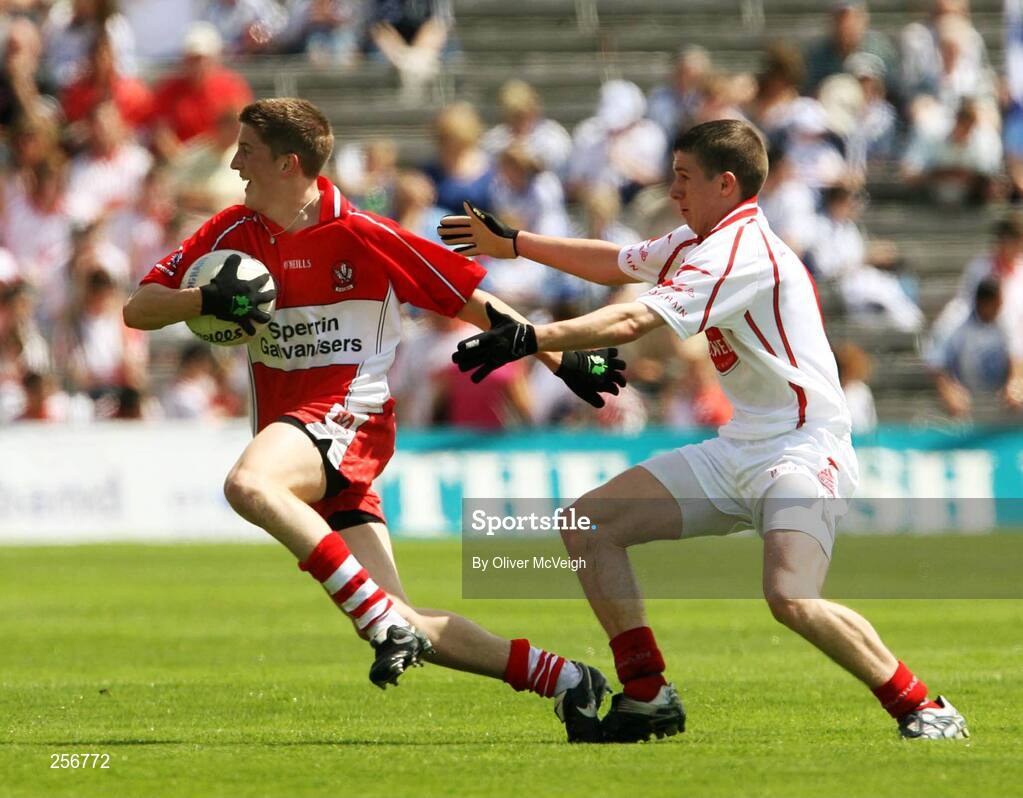 15 July 2007; Declan Mullan, Derry, in action against Kevin Mossey, Tyrone. ESB Ulster Minor Football Championship Final - Derry v Tyrone, St Tighearnach's Park, Clones, Co Monaghan. Picture credit: Oliver McVeigh / SPORTSFILE