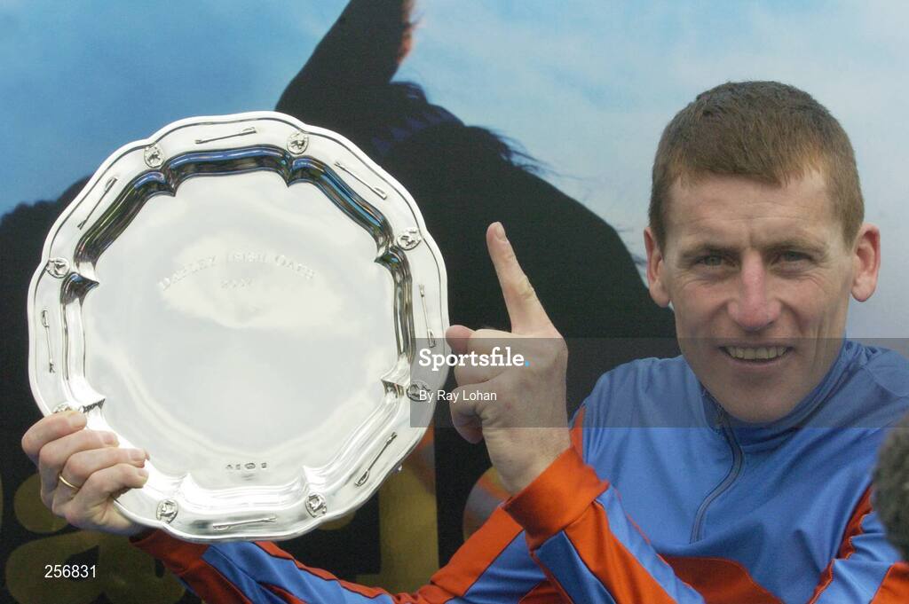 15 July 2007; Jockey Johnny Murtagh celebrates after winning the Darley Irish Oaks aboard Peeping Fawn. Curragh Racecourse, Co. Kildare. Picture credit: Ray Lohan / SPORTSFILE *** Local Caption ***