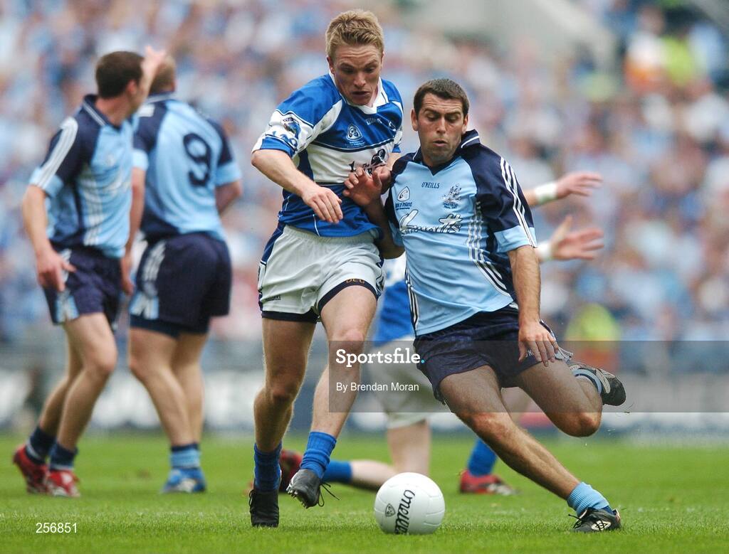 15 July 2007; Ross Munnelly, Laois, in action against David Henry, Dublin. Bank of Ireland Leinster Senior Football Championship Final, Dublin v Laois, Croke Park, Dublin. Picture credit: Brendan Moran / SPORTSFILE