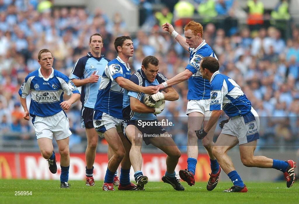 15 July 2007; Ciaran Whelan, Dublin, in action against Brendan Quigley, Padraig Clancy and Tom Kelly, right, Laois. Bank of Ireland Leinster Senior Football Championship Final, Dublin v Laois, Croke Park, Dublin. Picture credit: Brendan Moran / SPORTSFILE