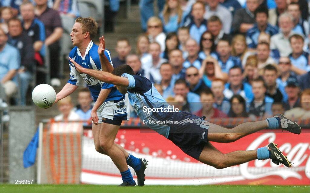15 July 2007; Ross Munnelly, Laois, in action against David Henry, Dublin. Bank of Ireland Leinster Senior Football Championship Final, Dublin v Laois, Croke Park, Dublin. Picture credit: Brendan Moran / SPORTSFILE
