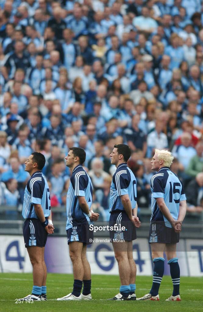 15 July 2007; Dublin forwards, from left, Jason Sherlock, Alan Brogan, captain Colin Moran and Mark Vaughan stand for the national anthem before the game in front of Hill 16. Bank of Ireland Leinster Senior Football Championship Final, Dublin v Laois, Croke Park, Dublin. Picture credit: Brendan Moran / SPORTSFILE
