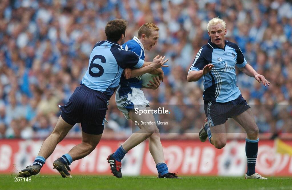 15 July 2007; Peter O'Leary, Laois, in action against Bryan Cullen, 6, and Mark Vaughan, Dublin. Bank of Ireland Leinster Senior Football Championship Final, Dublin v Laois, Croke Park, Dublin. Picture credit: Brendan Moran / SPORTSFILE
