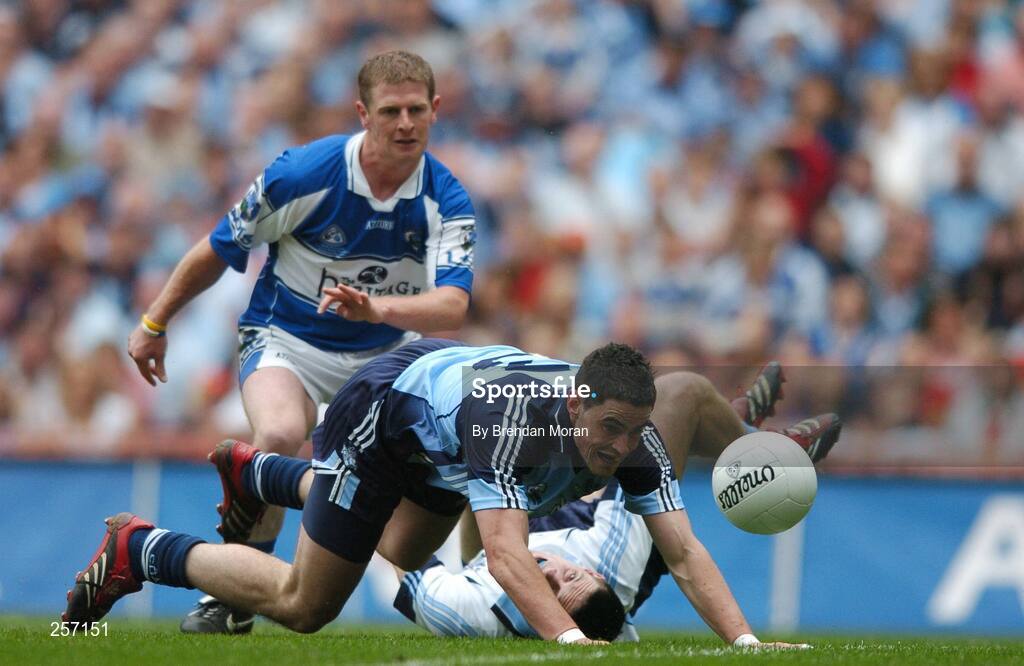 15 July 2007; Ross McConnell, Dublin, attempts to get to the ball ahead of team-mate Stephen Cluxton and Brian McDonald, Laois. Bank of Ireland Leinster Senior Football Championship Final, Dublin v Laois, Croke Park, Dublin. Picture credit: Brendan Moran / SPORTSFILE