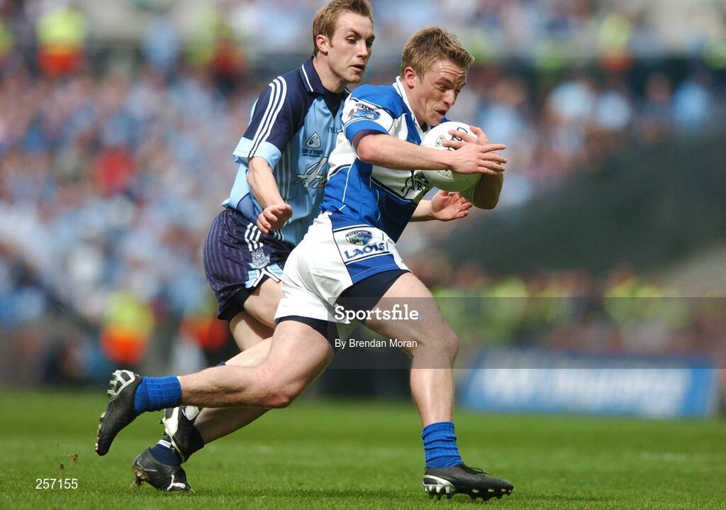 15 July 2007; Ross Munnelly, Laois, in action against Paul Griffin, Dublin. Bank of Ireland Leinster Senior Football Championship Final, Dublin v Laois, Croke Park, Dublin. Picture credit: Brendan Moran / SPORTSFILE