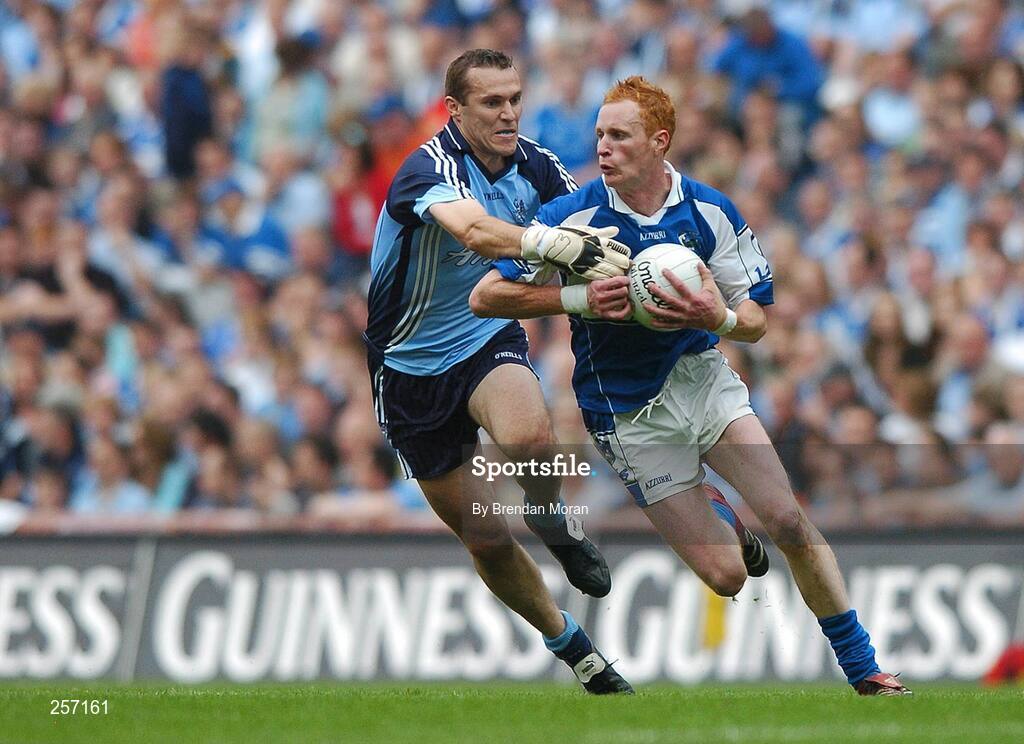15 July 2007; Padraig Clancy, Laois, in action against Ciaran Whelan, Dublin. Bank of Ireland Leinster Senior Football Championship Final, Dublin v Laois, Croke Park, Dublin. Picture credit: Brendan Moran / SPORTSFILE