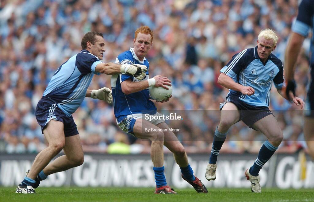 15 July 2007; Padraig Clancy, Laois, in action against Ciaran Whelan, left, and Mark Vaughan, Dublin. Bank of Ireland Leinster Senior Football Championship Final, Dublin v Laois, Croke Park, Dublin. Picture credit: Brendan Moran / SPORTSFILE