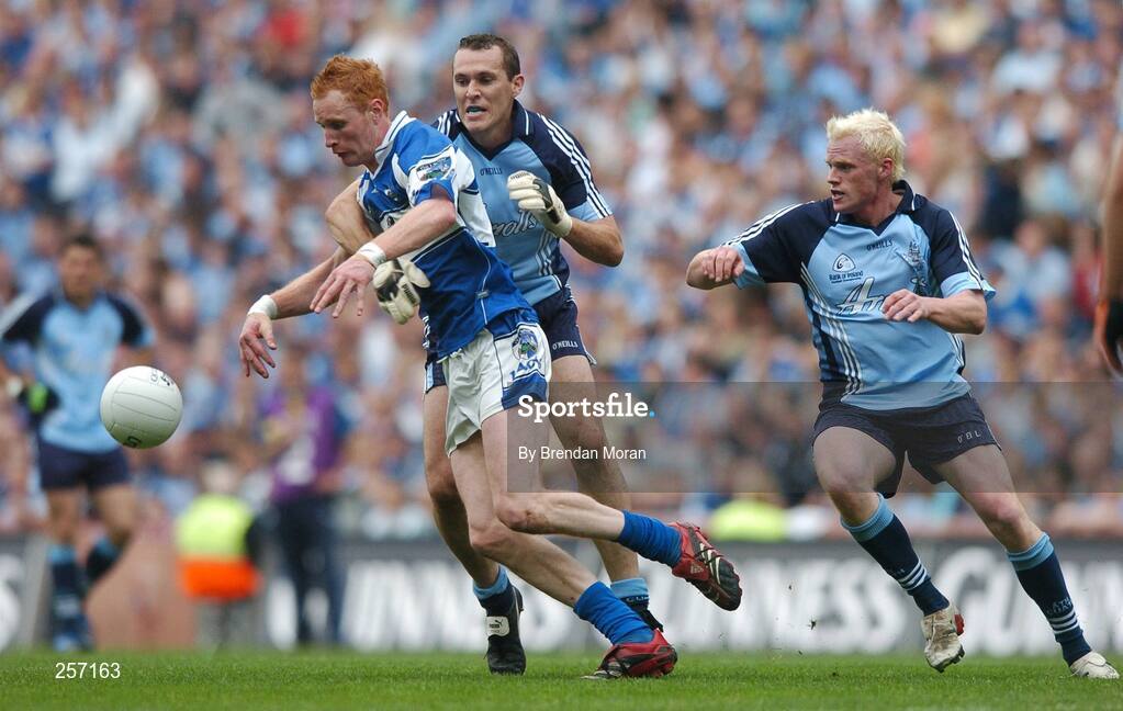 15 July 2007; Padraig Clancy, Laois, in action against Ciaran Whelan and Mark Vaughan, right, Dublin. Bank of Ireland Leinster Senior Football Championship Final, Dublin v Laois, Croke Park, Dublin. Picture credit: Brendan Moran / SPORTSFILE