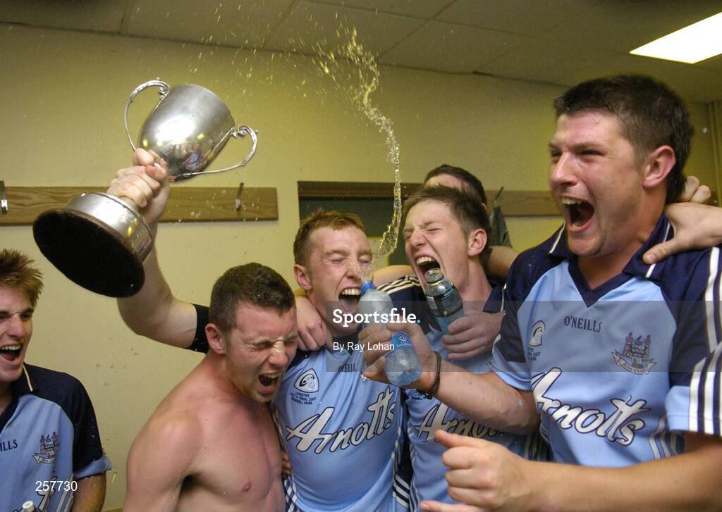 18 July 2007; Dublin players, from left, Jack Gilligan, John McCaffrey, Eugene Farrell, and Eoin Moran celebrate in the dressing room with the cup. U21 Leinster Hurling Championship final, Dublin v Offaly, Parnell Park, Dublin. Picture Credit; Ray Lohan / SPORTSFILE *** Local Caption ***