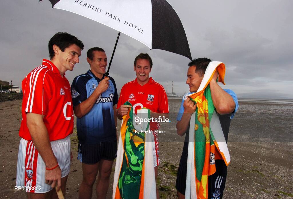 17 July 2007; Dublin footballers Jason Sherlock, right, and Ciaran Whelan, Cork hurler Tom Kenny, left, and Cork footballer James Masters, were announced as Ariel GAA Championship Bright Ambassadors for 2007. This summer, Ariel is giving away free exclusive GAA towels with promotional packs. Martello Tower, Sandymount Strand, Dublin. Picture credit: Ray McManus / SPORTSFILE