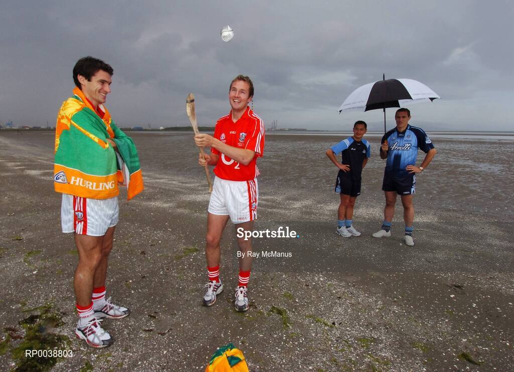 17 July 2007; Dublin footballers Jason Sherlock and Ciaran Whelan, right, Cork hurler Tom Kenny, left, and Cork footballer James Masters, were announced as Ariel GAA Championship Bright Ambassadors for 2007. This summer, Ariel is giving away free exclusive GAA towels with promotional packs. Martello Tower, Sandymount Strand, Dublin. Picture credit: Ray McManus / SPORTSFILE