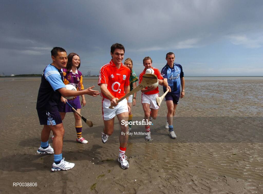 17 July 2007; Dublin footballers Jason Sherlock, left, and Ciaran Whelan, right, Cork hurler Tom Kenny, centre, and Cork footballer James Masters, were announced as Ariel GAA Championship Bright Ambassadors for 2007. Ladies Football All Star Grainne Nulty from Meath and Wexford Camogie captain Mary Leacy also attended the launch event. This summer, Ariel is giving away free exclusive GAA towels with promotional packs. Martello Tower, Sandymount Strand, Dublin. Picture credit: Ray McManus / SPORTSFILE