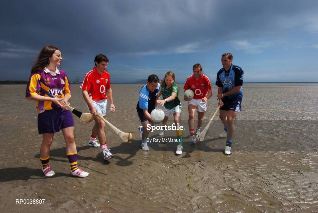 17 July 2007; Dublin footballers Jason Sherlock and Ciaran Whelan, right, Cork hurler Tom Kenny, second from left, and Cork footballer James Masters, were announced as Ariel GAA Championship Bright Ambassadors for 2007. Ladies Football All Star Grainne Nulty from Meath and Wexford Camogie captain Mary Leacy also attended the launch event. This summer, Ariel is giving away free exclusive GAA towels with promotional packs. Martello Tower, Sandymount Strand, Dublin. Picture credit: Ray McManus / SPORTSFILE