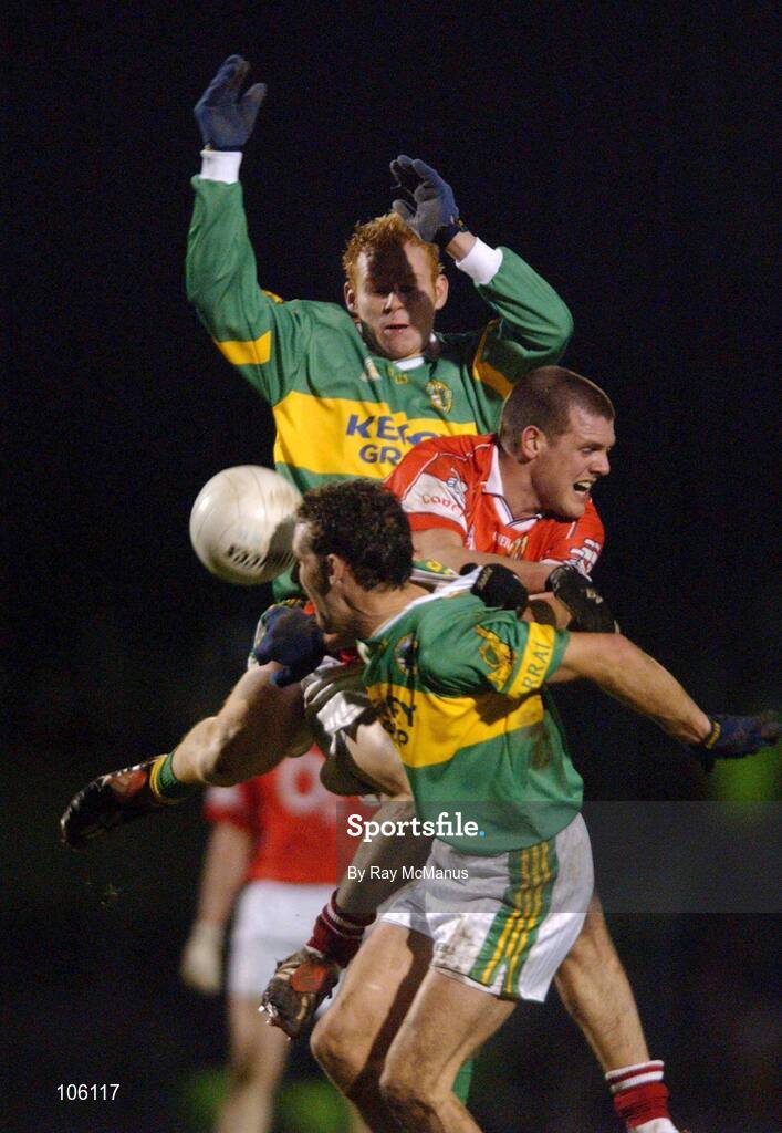 1 February 2003; Seamus Scanlon, back and John Sheehan, Kerry, contest a high ball with Cork's Brendan Jer O'Sullivan. National Football Leage Division 1A, Pairc Ui Rinn, Co. Cork. Picture credit; Ray McManus / SPORTSFILE