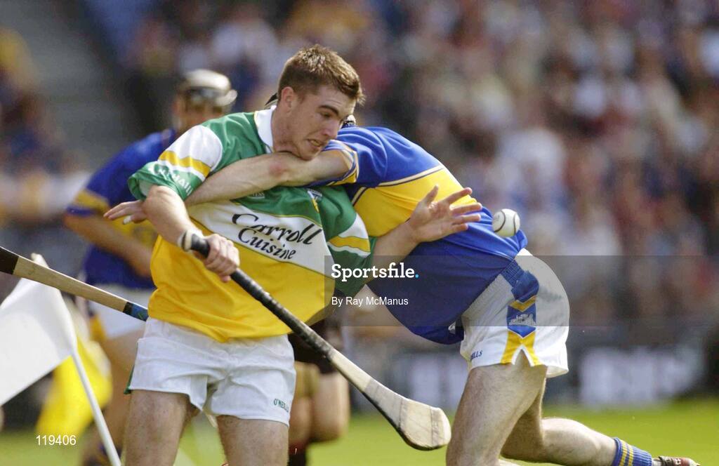 27 July 2003; Brian Carroll, Offaly, in action against Tipperary's Thomas Costello. Guinness All-Ireland Senior Hurling Championship Quarter-final, Offaly v Tipperary, Croke Park, Dublin. Picture credit; Ray McManus / SPORTSFILE