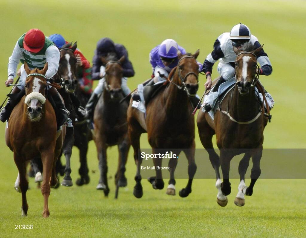 1 July 2006; Alexander Goldrun, right, with Kevin Manning up, on their way to winning the Audi Pretty Polly Stakes from Chelsea Rose with Pat Shanahan, extreme left. The Curragh Racecourse, Co. Kildare. Picture credit: Matt Browne / SPORTSFILE