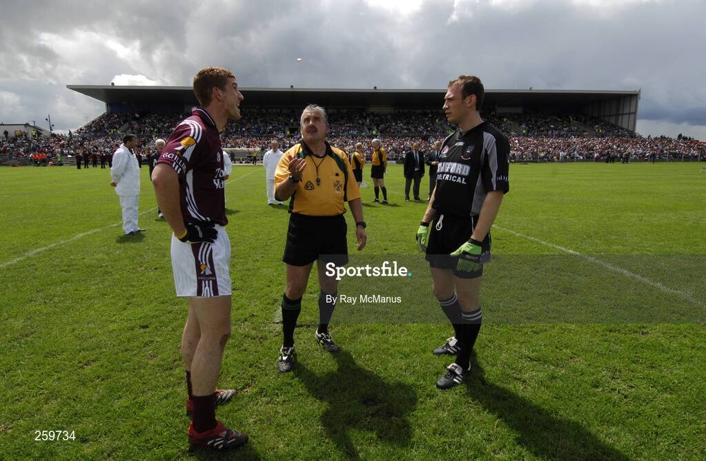 8 July 2007; Referee Brian Crowe tosses the coin between Galway captain Kieran Fitzgerald and Sligo captain Noel McGuire, right, before the game. Bank of Ireland Connacht Senior Football Championship Final, Galway v Sligo, Dr. Hyde Park, Roscommon. Picture credit: Ray McManus / SPORTSFILE