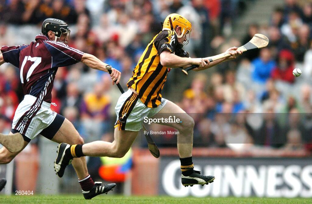 28 July 2007; Kilkenny's Richie Power scores his side's first goal despite the tackle of Galway's Damien Joyce. Guinness All-Ireland Senior Hurling Championship Quarter-Final, Kilkenny v Galway, Croke Park, Dublin. Picture credit; Brendan Moran / SPORTSFILE