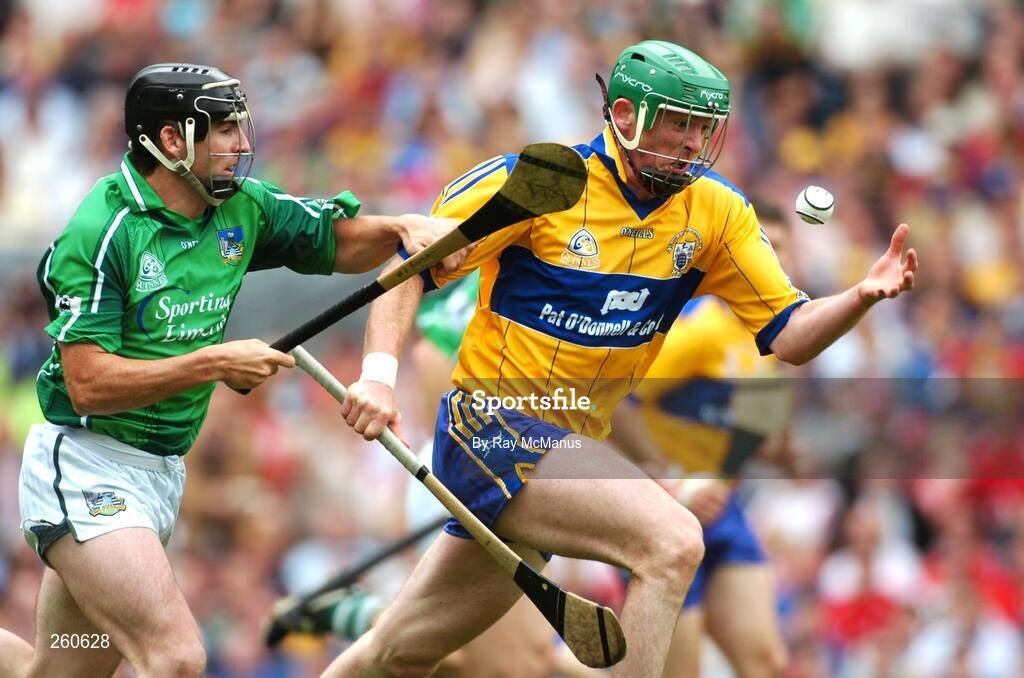 29 July 2007; Clare's Diarmuid McMahon races past Limerick's Mark O'Riordan on his way to score a goal. Guinness All-Ireland Senior Hurling Championship Quarter-Final, Clare v Limerick, Croke Park, Dublin. Picture credit; Ray McManus / SPORTSFILE