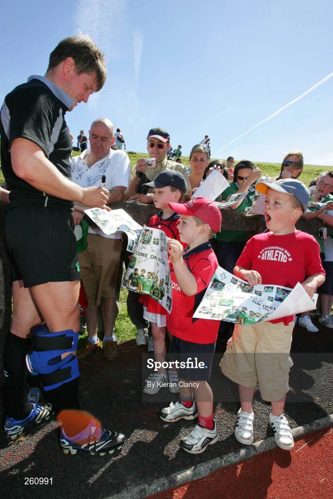 31 July 2007; Ireland's Ronan O'Gara signs autographs for fans Conor Kennedy, Jack Stockil and Declan Kennedy following squad training. Ireland Rugby Squad Training, University of Limerick, Limerick. Picture credit: Kieran Clancy / SPORTSFILE