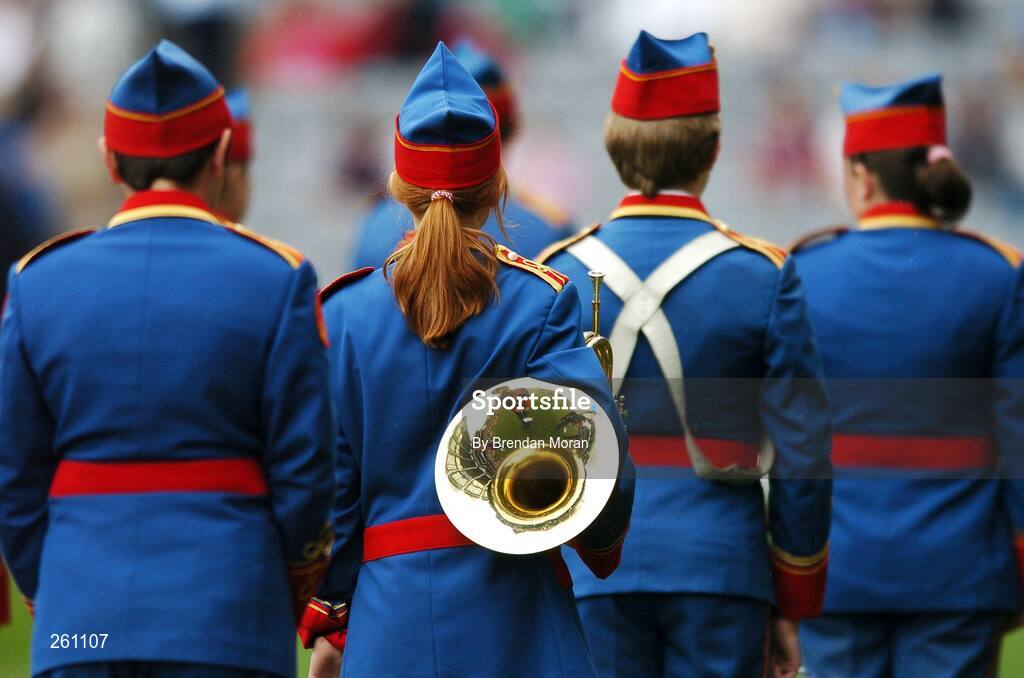 28 July 2007; A member of the Artane Band holds her French Horn during a break in their recital. Guinness All-Ireland Senior Hurling Championship Quarter-Final, Kilkenny v Galway, Croke Park, Dublin. Picture credit; Brendan Moran / SPORTSFILE