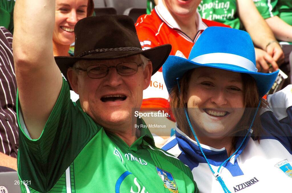 29 July 2007; A Limerick and a Waterford supporter watch the game. Guinness All-Ireland Senior Hurling Championship Quarter-Final, Clare v Limerick, Croke Park, Dublin. Picture credit; Ray McManus / SPORTSFILE